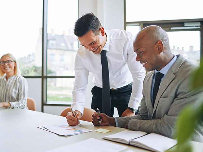 3RE Professional Looking over paperwork in the office